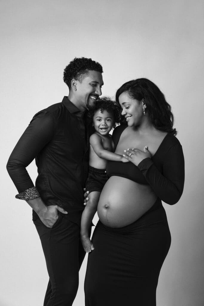 Emotional maternity portrait with family in Scottsdale studio